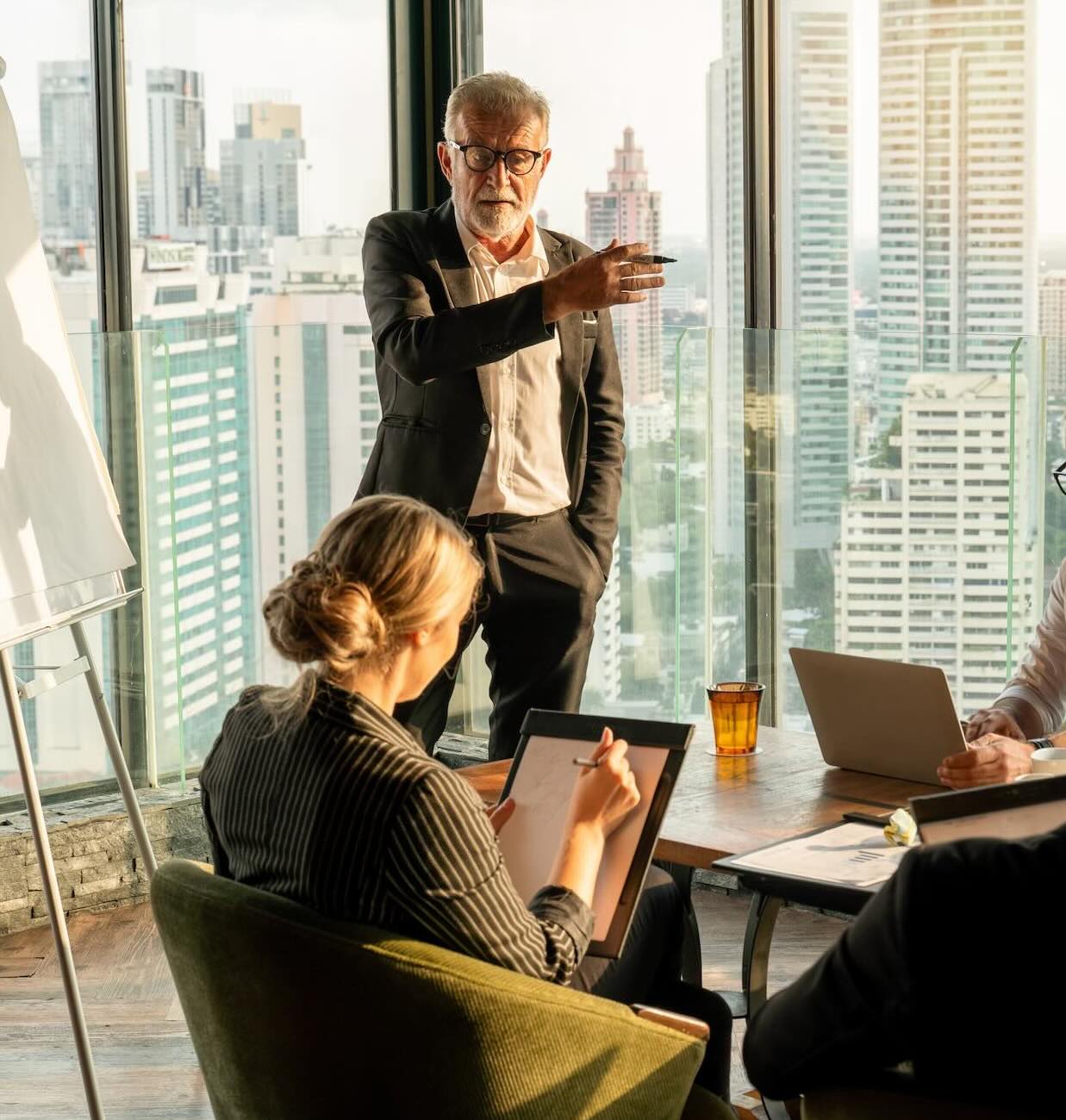 Senior business man giving presentation